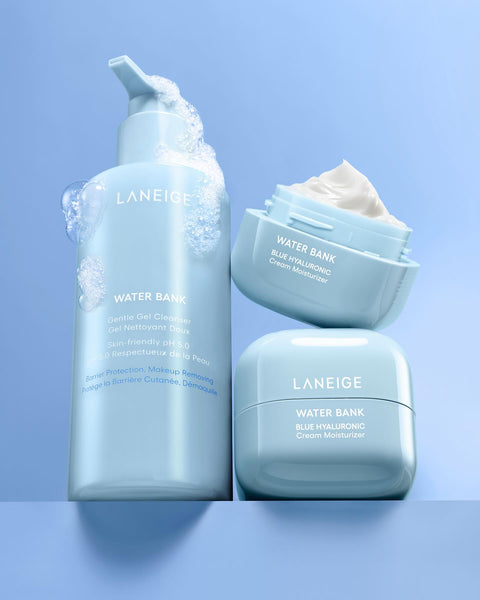 Set of two creams and a body gel from the Lainage brand, all in blue packaging